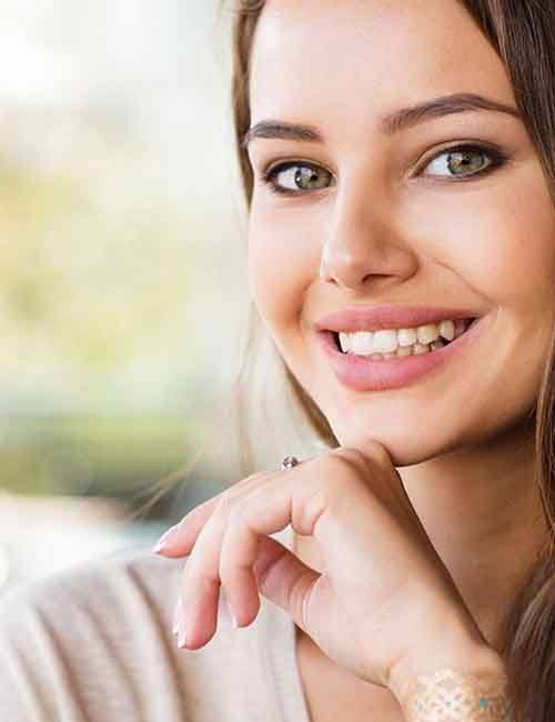 Close up of woman with a healthy smile