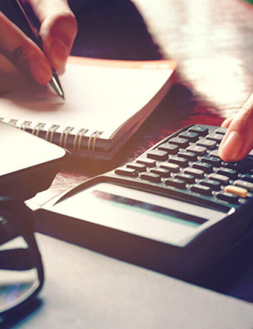 woman using calculator