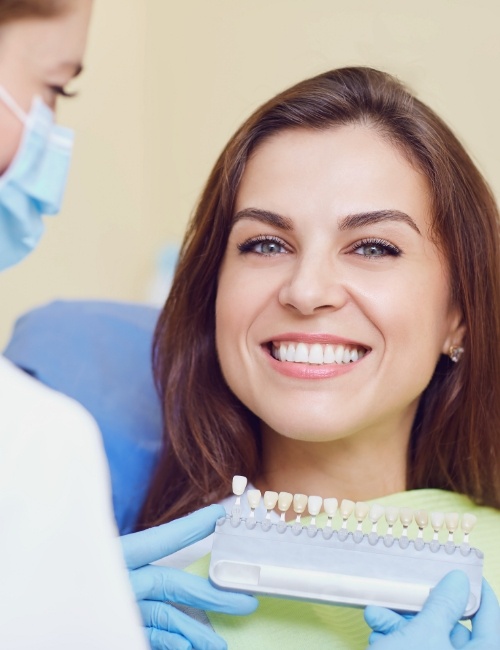 Woman smiling after cosmetic dental bonding