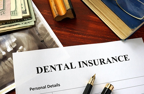 Dental insurance form on a table