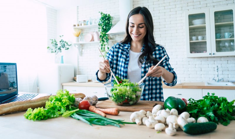 Woman making a salad